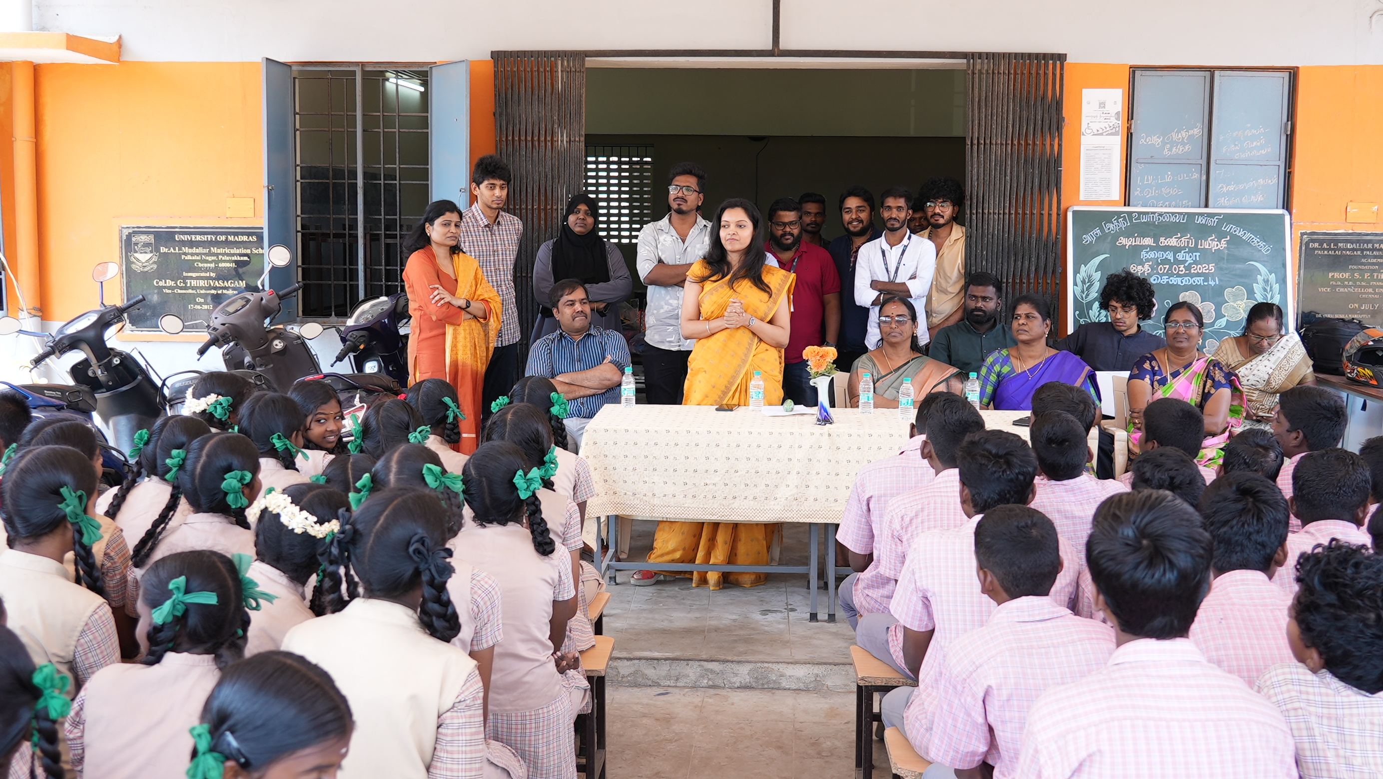 Volunteers and school staff before the completion ceremony begins