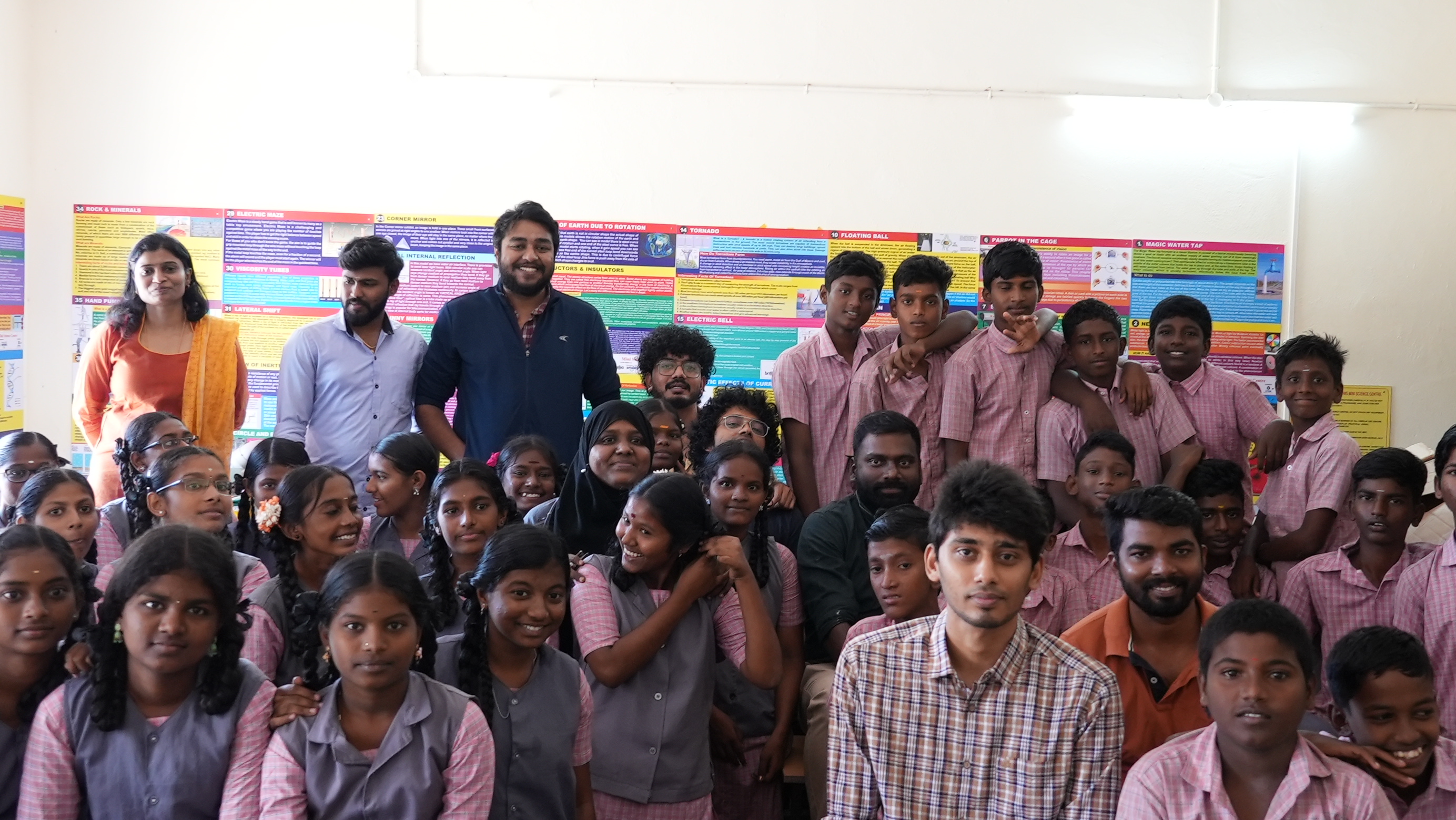 Another group photo with the science lab exhibits in the background
