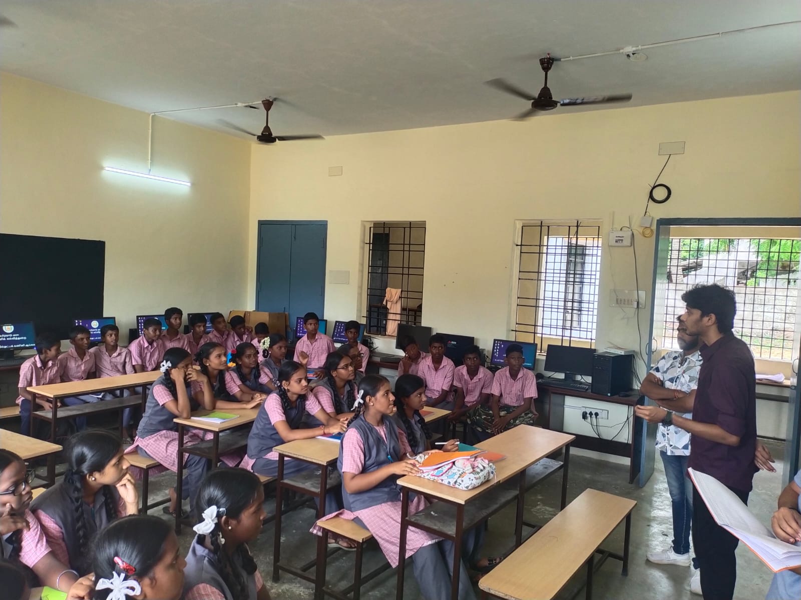 Volunteers introducing the program to the class