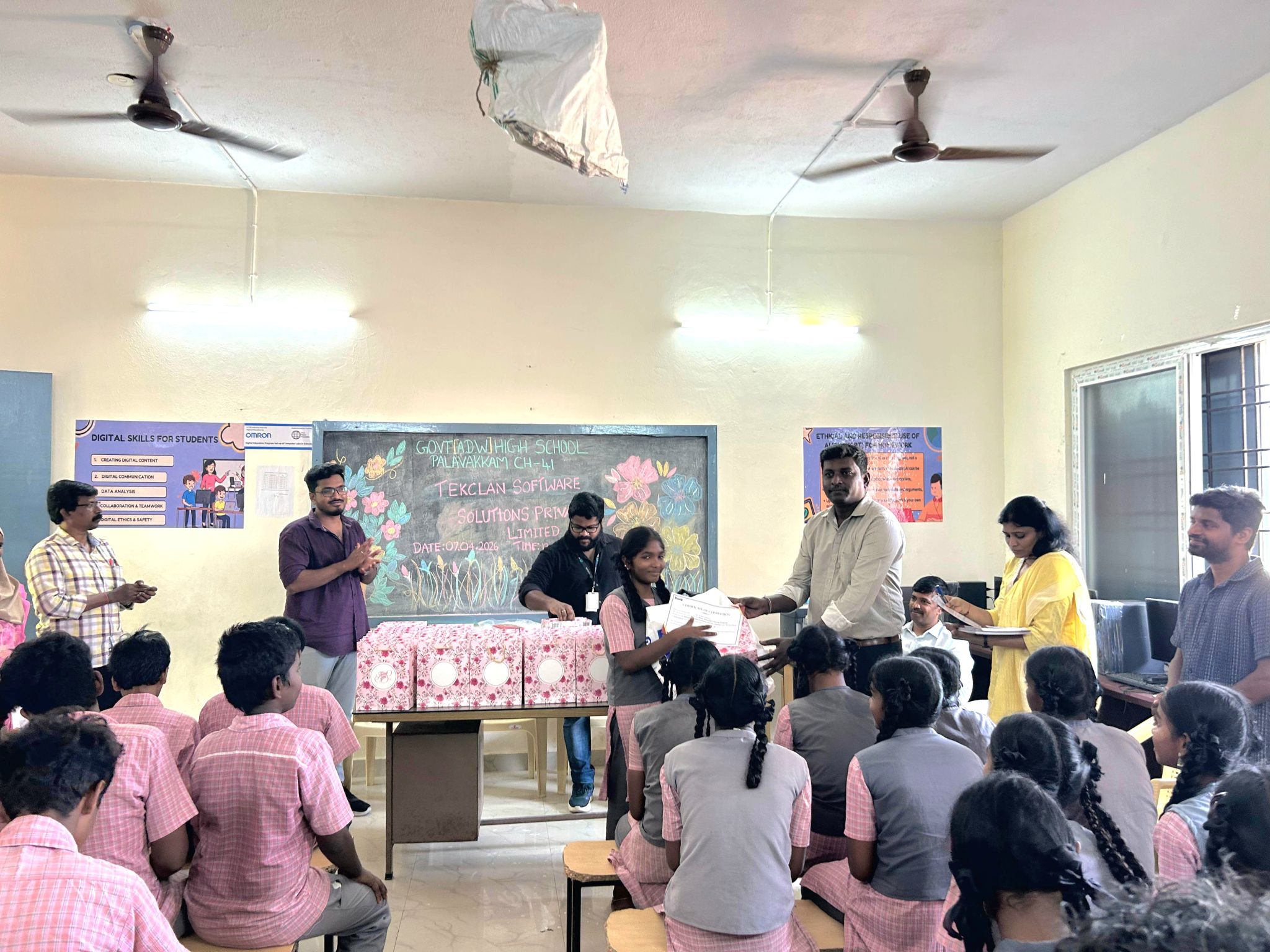 A student receives her certificate of completion