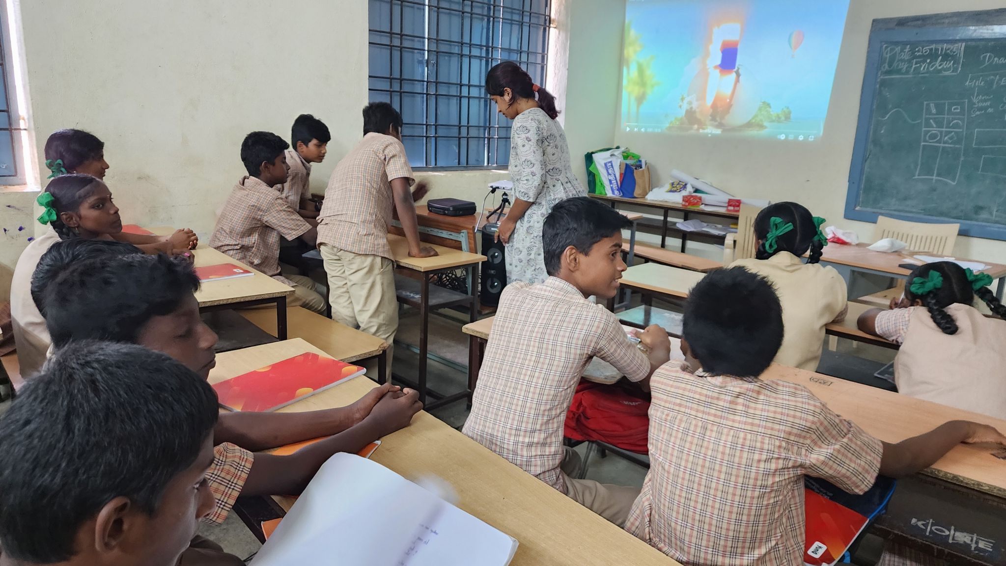 Watching and learning together during a projector session