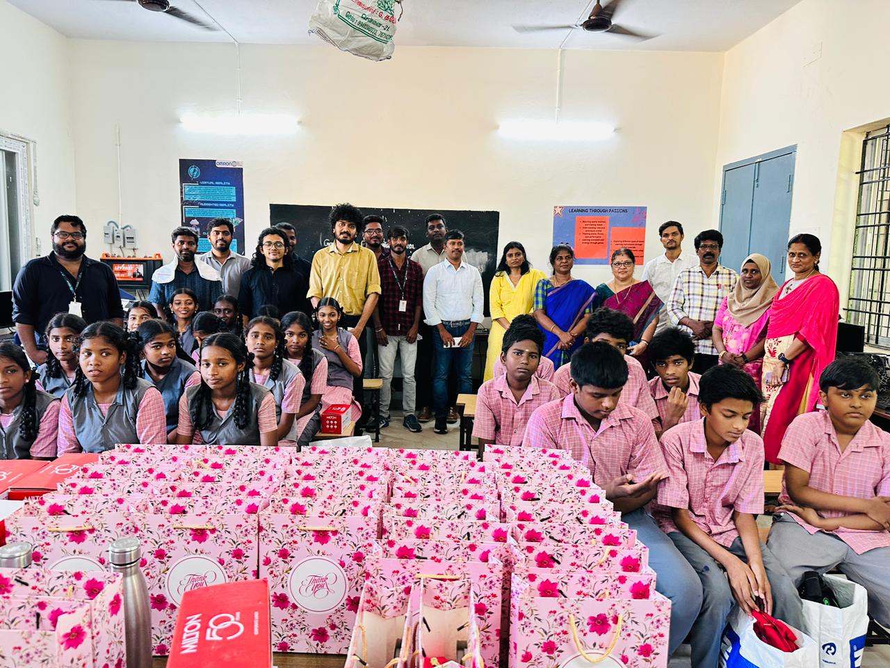 Students, teachers, and volunteers together for the gift distribution ceremony