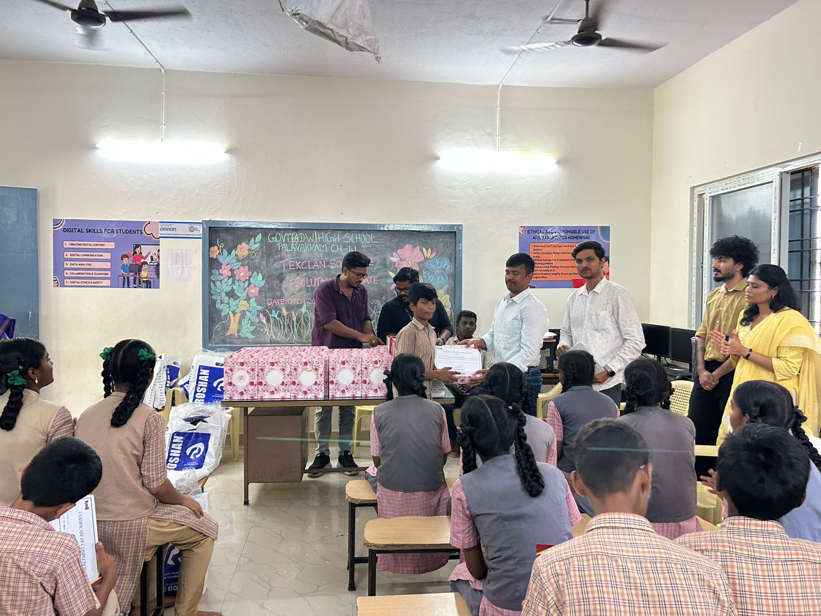 Students, teachers, and volunteers together for the gift distribution ceremony